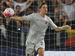 ROME, ITALY - AUGUST 14: Wojciech Szczesny  of AS Roma in action during the pre-season friendly match between AS Roma and Sevilla FC at Olimpico Stadium on August 14, 2015 in Rome, Italy.  (Photo by Giuseppe Bellini/Getty Images)